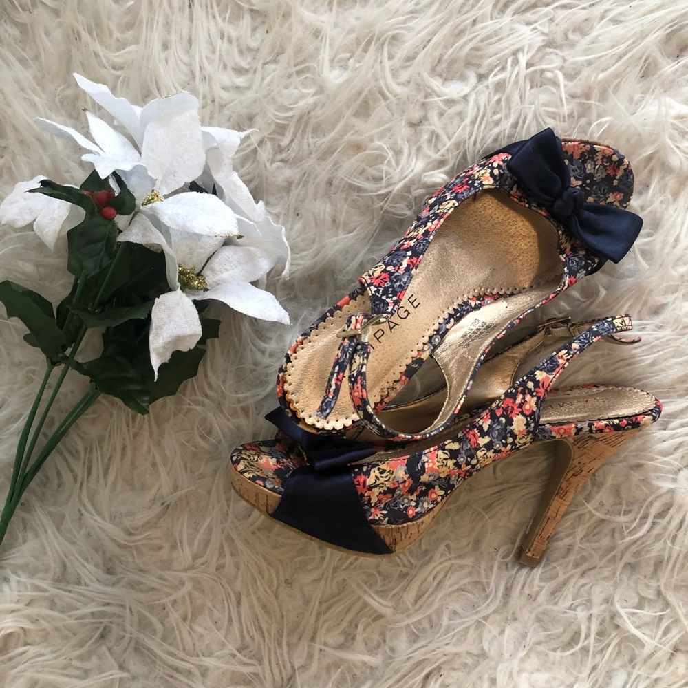 High heeled shoes accented with delicate bow